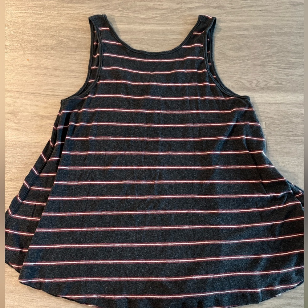 Free people swing tank, oversized. Lower cut in the back